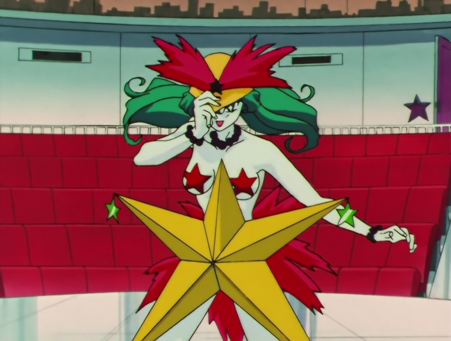 U-Chouten, a Daimon from Sailor Moon episode 119. Oh boy, this is gonna be challenging to describe. She has pale white skin and green hair. On her head, she wears a gold helmet with red feathers protruding from it. Two red, star shaped pasties cover her boobs, but apparently not decisively enough for Cartoon Network. As for her lower half, she has an enormous star positioned over her crotch, and there’s more red feathers behind it, so there may be some semblance of a skirt there, at least at the back.